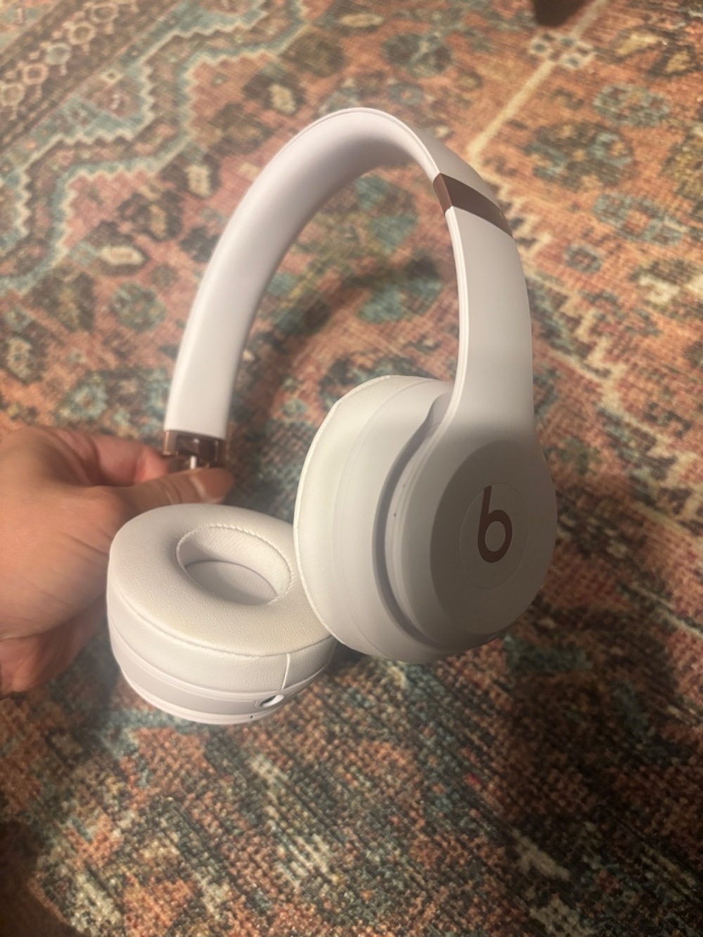 Beats Solo 4 Wireless Over-Ear Headphones in Light Gray with Rose Gold Accents. - Picture 2 of 8